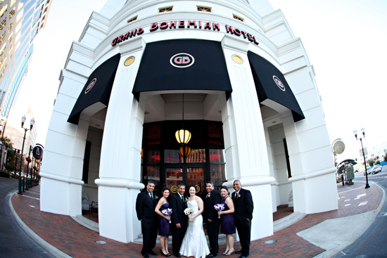 Wedding party posing in front of the Grand Bohemian Hotel, Orlando