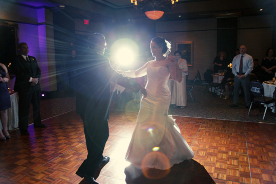 Bride and groom share their first dance at a wedding reception