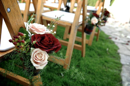Wedding chair decorations: blush and burgundy roses