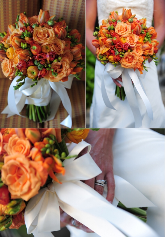 Orange wedding bouquet with white ribbon