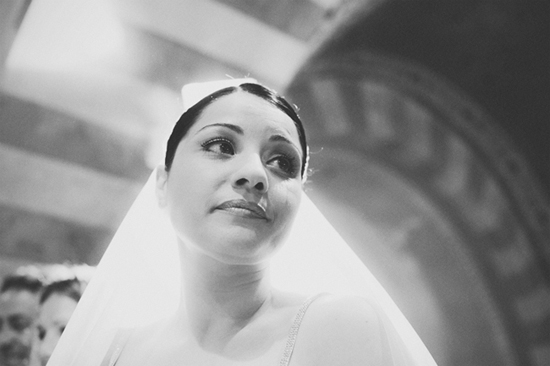 Black and white photo of a bride with thoughtful look