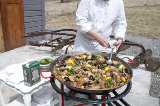 Delicious seafood paella in a large pan