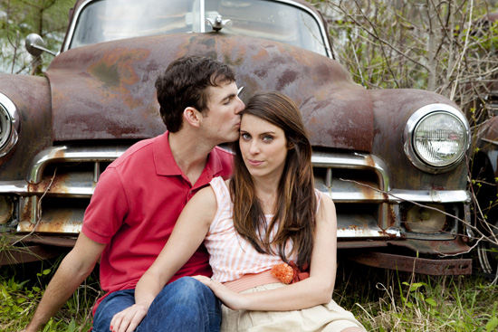 couple in front of old car