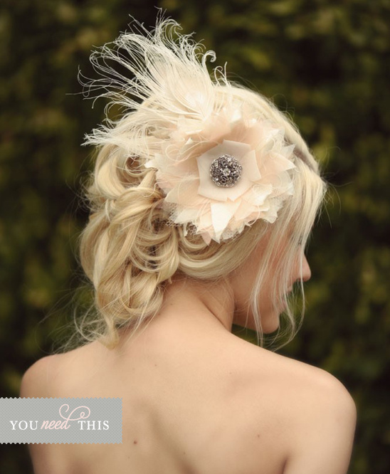 Blonde bride with feather flower hair accessory