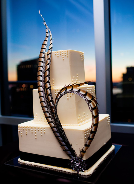 Elegant square wedding cake with feather details