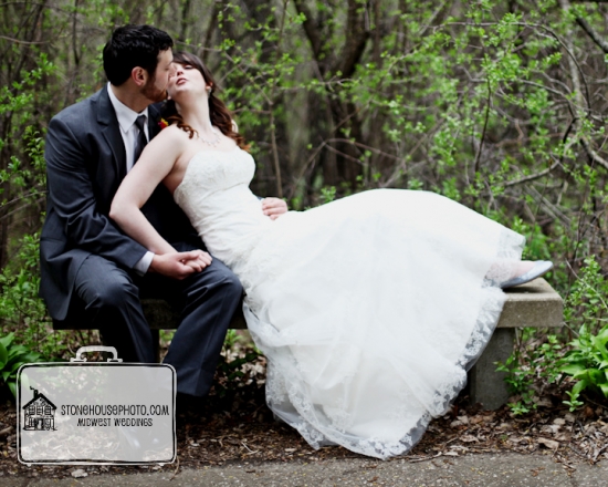Romantic couple kissing on a park bench