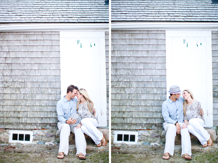 Loving couple sits near a weathered building on a sunny day