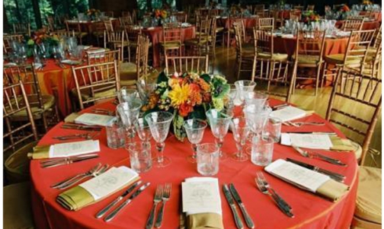 Elegant red tablecloth wedding reception tablescape