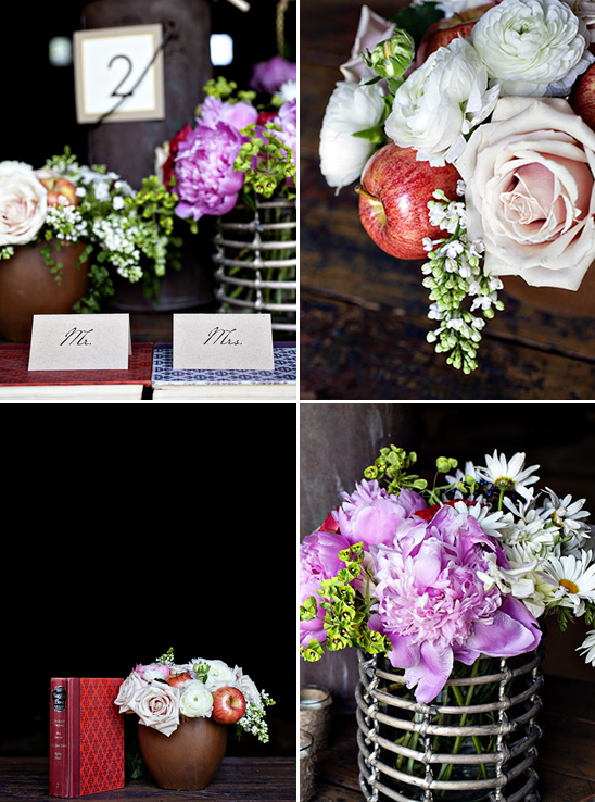 Charming floral centerpieces with apples and rustic vases