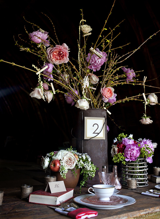 Rustic wedding table decor with floral arrangements