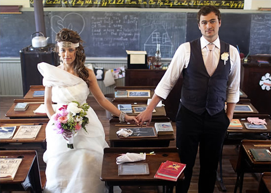 Retro wedding Bride and groom holding hands in school