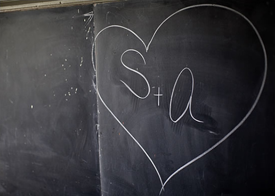 Chalkboard heart with the initials S plus A inside
