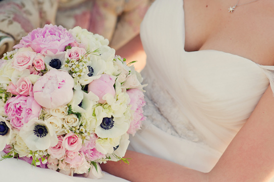 Bride holding a beautiful pink and white wedding bouquet