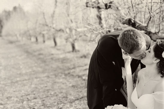 Romantic black and white wedding kiss