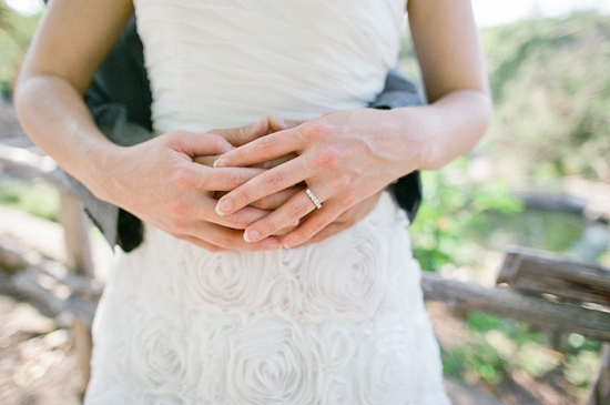 Couple holding hands, wedding day love