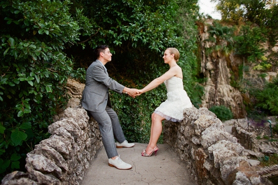 Couple holding hands outdoors wedding