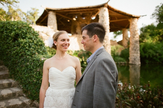 Bride and groom gaze at each other on wedding day