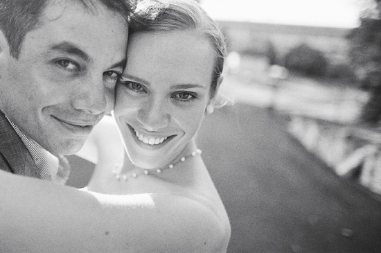 Black and white portrait of a smiling wedding couple