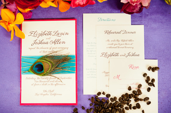 Elegant wedding invitation suite with peacock feather