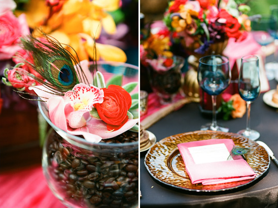 Vibrant floral centerpiece with peacock feather