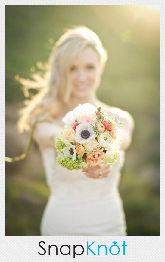 Bride holding beautiful wedding bouquet