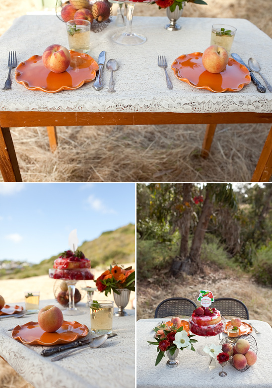 Elegant peach themed table setting with cake and flowers