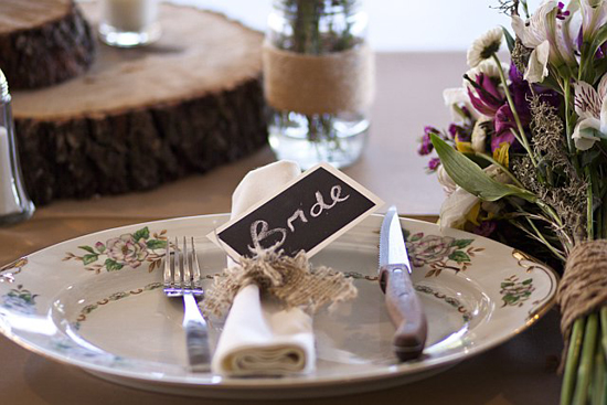Bride's place setting with flowers and rustic decor