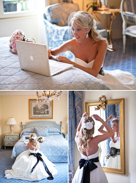 Bride in gown using laptop and getting ready for her wedding