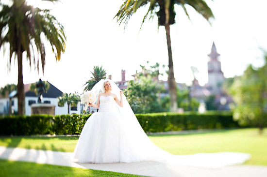 Bride in white gown outdoors in St Augustine Florida