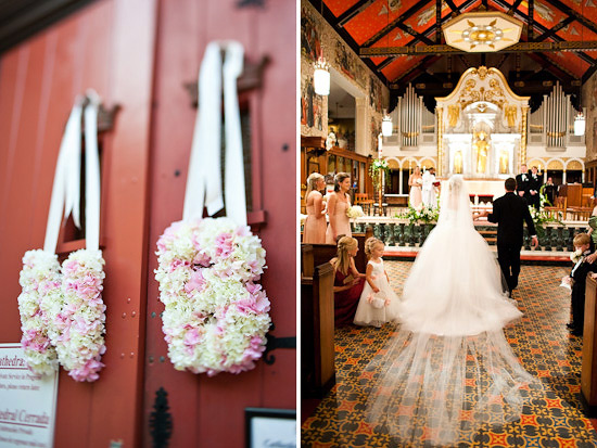 Bride walks down aisle with floral decoration on church doors