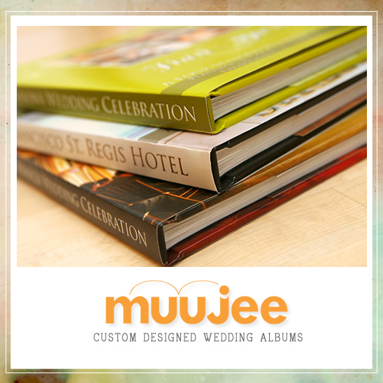 Stack of wedding albums with Wedding Celebration titles