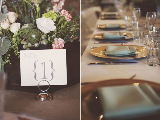Elegant wedding table setting with flowers and table number