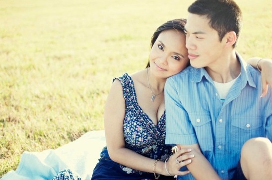 Happy couple embracing outdoors in summer