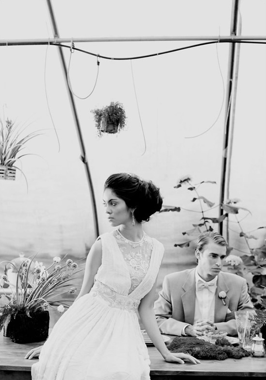 Couple in greenhouse wedding dress