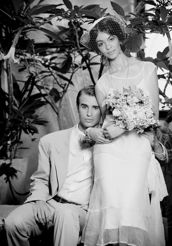 Elegant black and white wedding photo of a happy couple