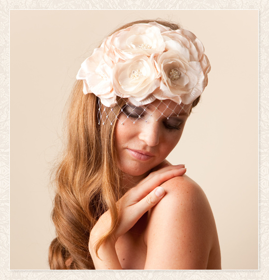 Elegant blush floral bridal headpiece with veil