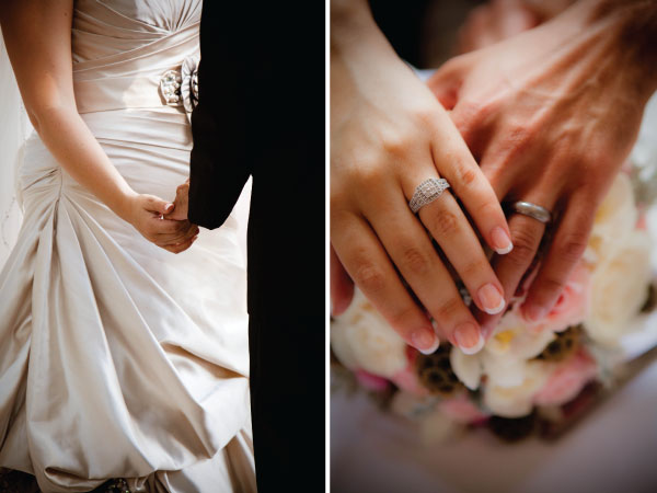 Bride and groom holding hands showing wedding rings