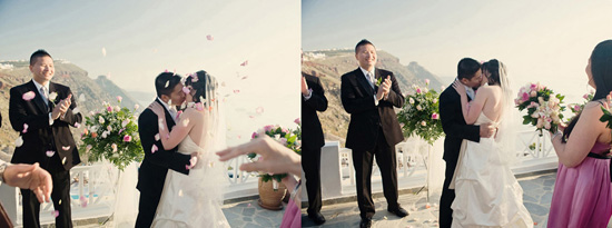 Wedding kiss Santorini backdrop with flower petals