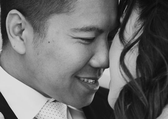 Smiling couple embracing in monochrome portrait
