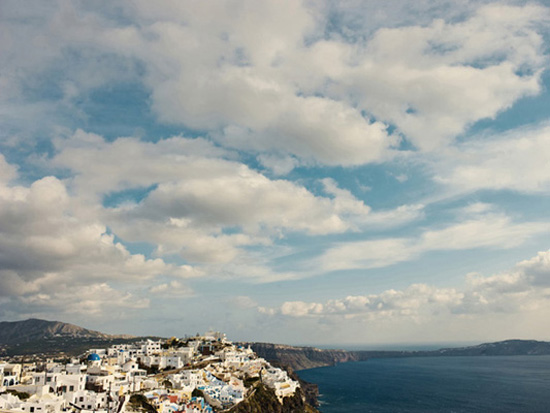 Greek island town with dramatic sky
