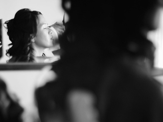 Woman getting makeup applied