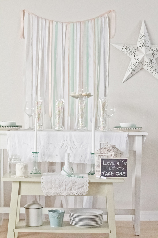 Pastel ribbon backdrop for elegant party table