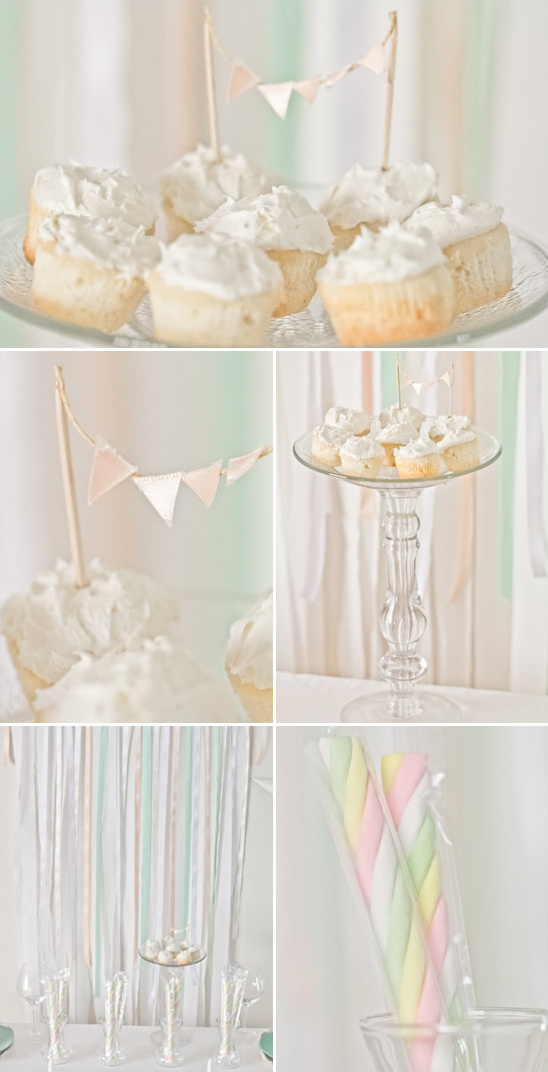 Pastel cupcakes and candy buffet table