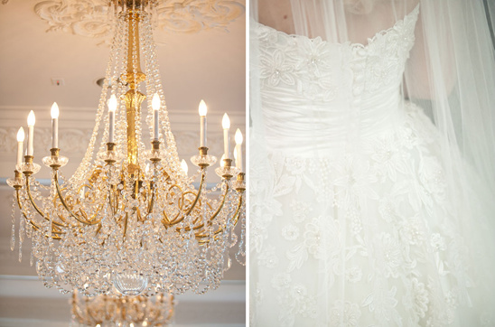 Elegant crystal chandelier and lace wedding dress
