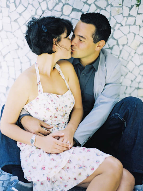 Couple kissing, happy lovers embrace