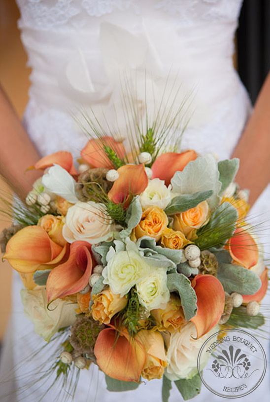 Stunning autumnal wedding bouquet with orange and cream flowers
