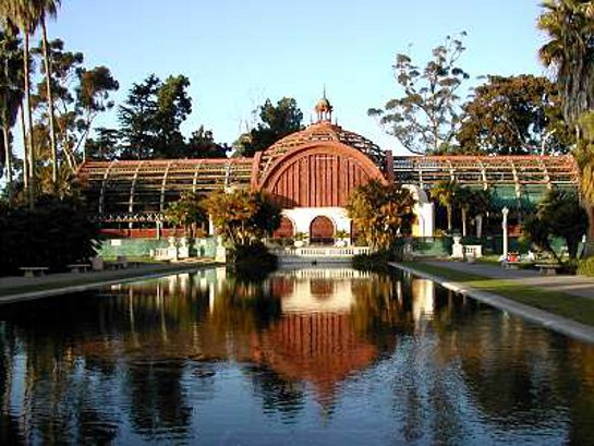 Beautiful botanical garden with reflection pool and red building