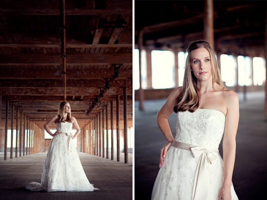 Bride in elegant wedding gown in rustic warehouse