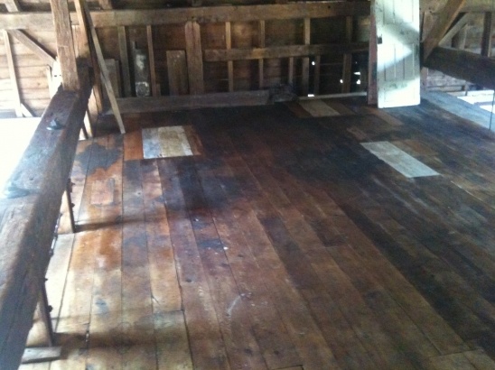 Old barn wood floor, showing age and wear