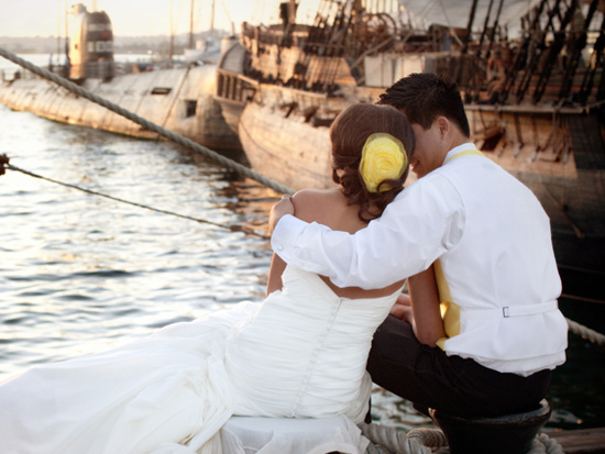 Bride and groom embrace at a nautical themed wedding